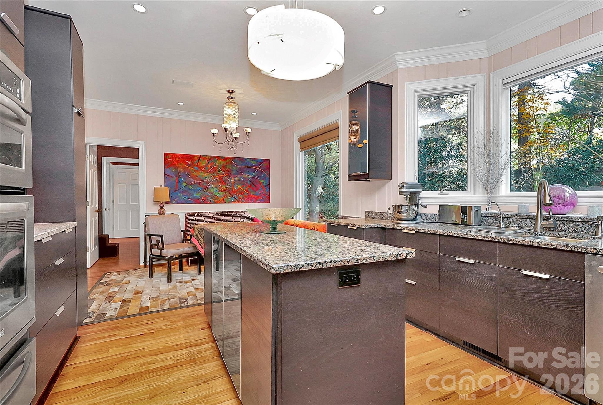 304 South Canterbury Road Charlotte, NC 28211 - Photo 5 of 39 a dining hall with stainless steel appliances granite countertop a stove and a sink