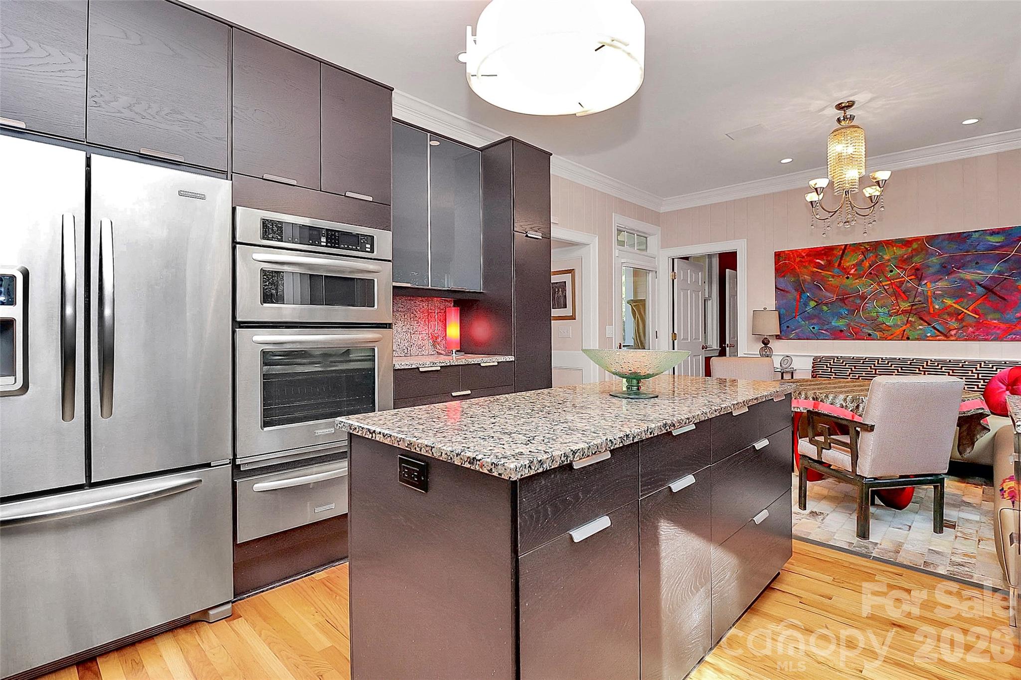 304 South Canterbury Road Charlotte, NC 28211 - Photo 8 of 39 a kitchen with stainless steel appliances granite countertop a sink refrigerator and microwave