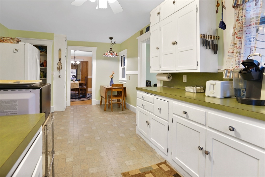 30 Wexford Street Springfield, MA 01118 - Photo 8 of 27 a kitchen with sink cabinets and outdoor view