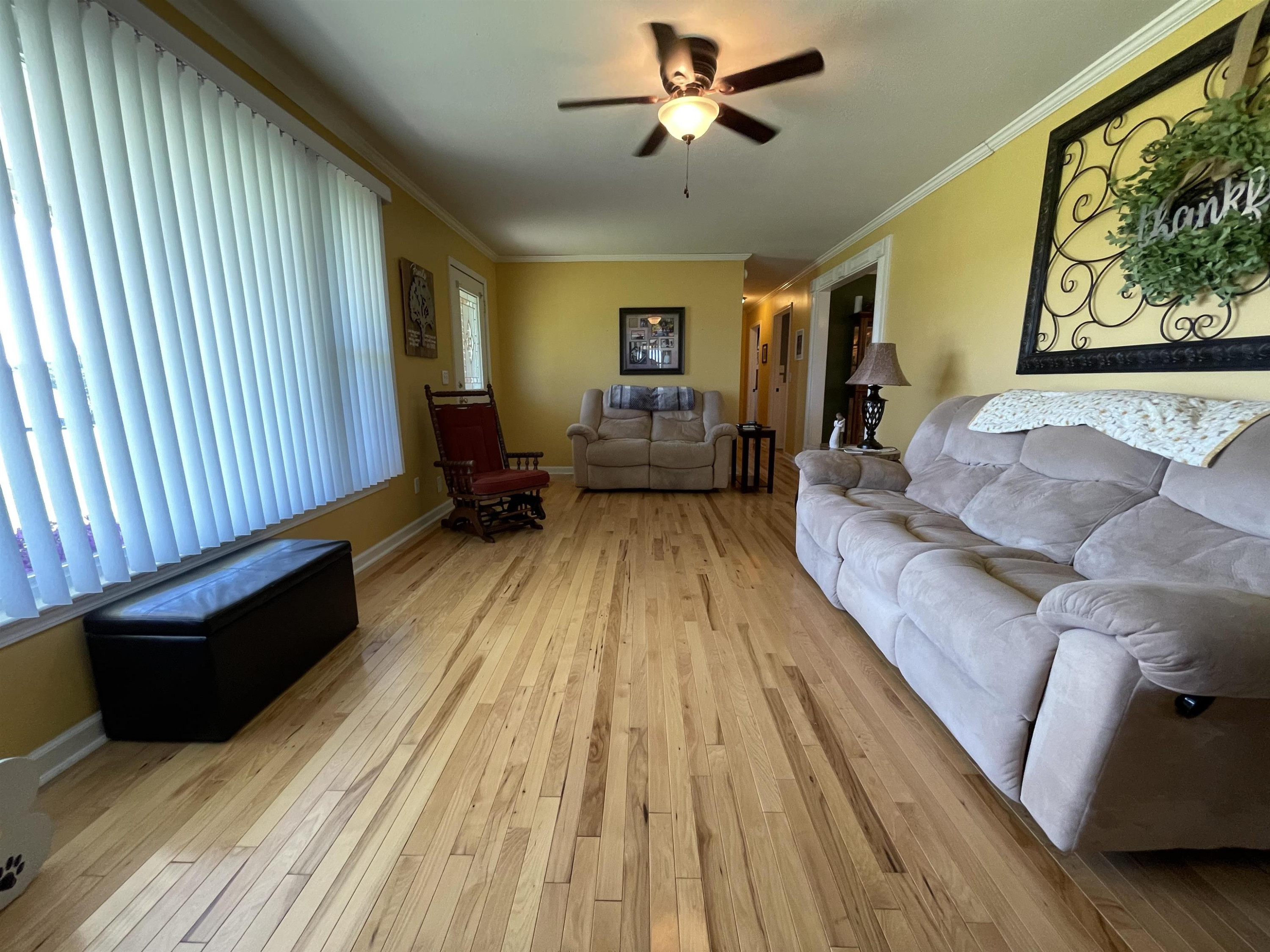 2507 East Grove Road Gleason, TN 38229 - Photo 12 of 37 a living room with furniture and a wooden floor