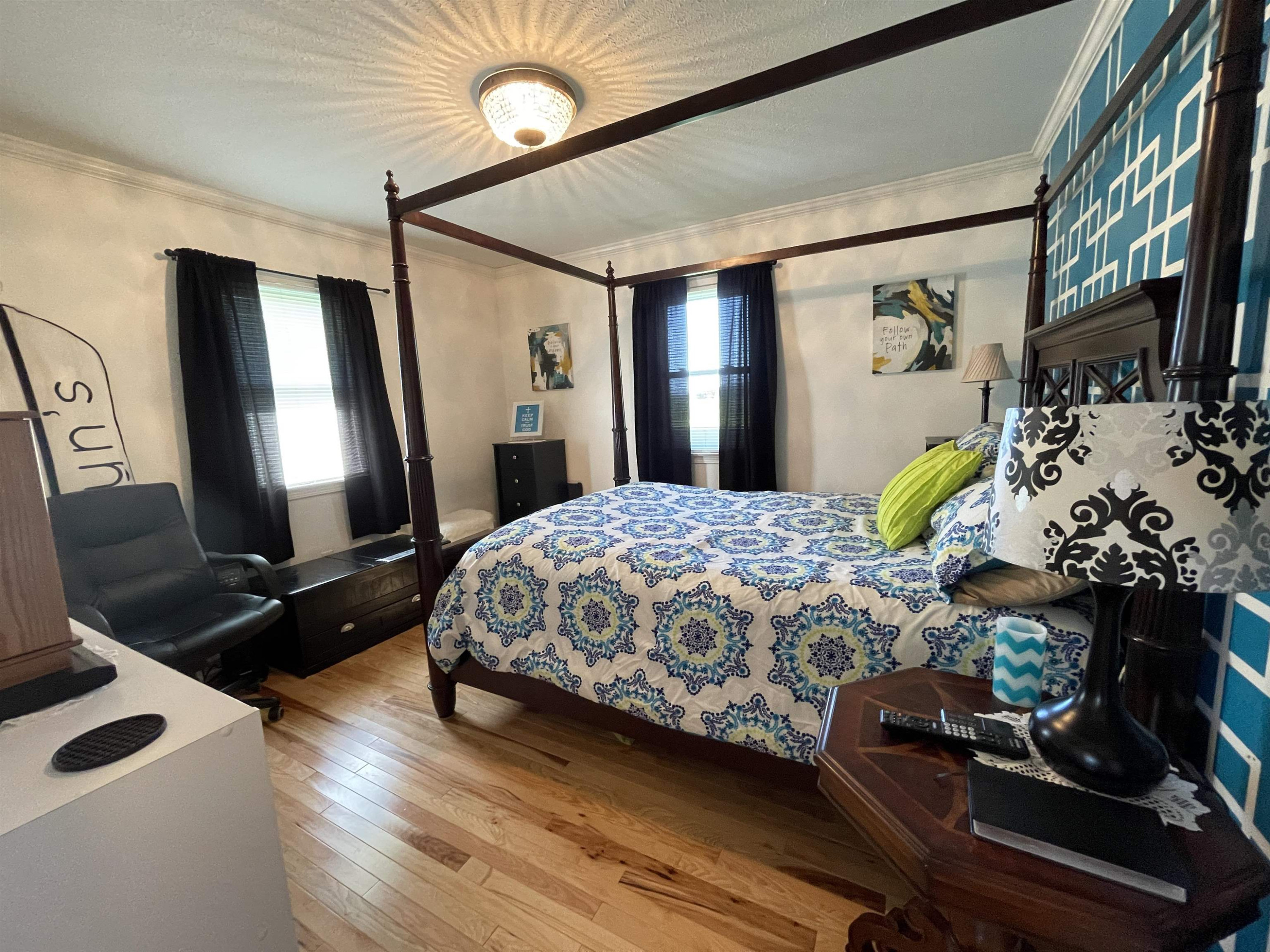 2507 East Grove Road Gleason, TN 38229 - Photo 20 of 37 a bedroom with a bed dresser and a window