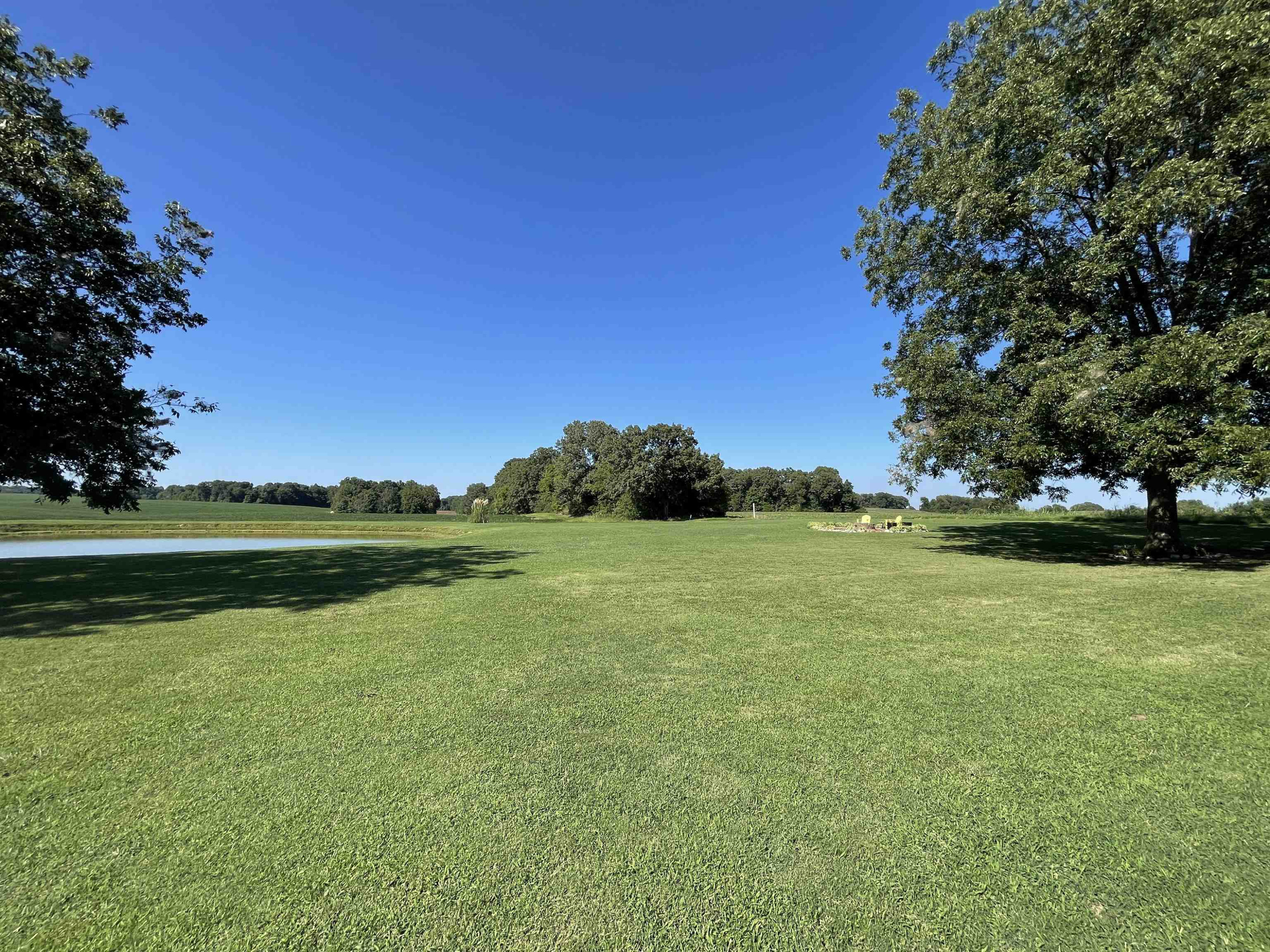 2507 East Grove Road Gleason, TN 38229 - Photo 28 of 37 a view of a golf course with a lake