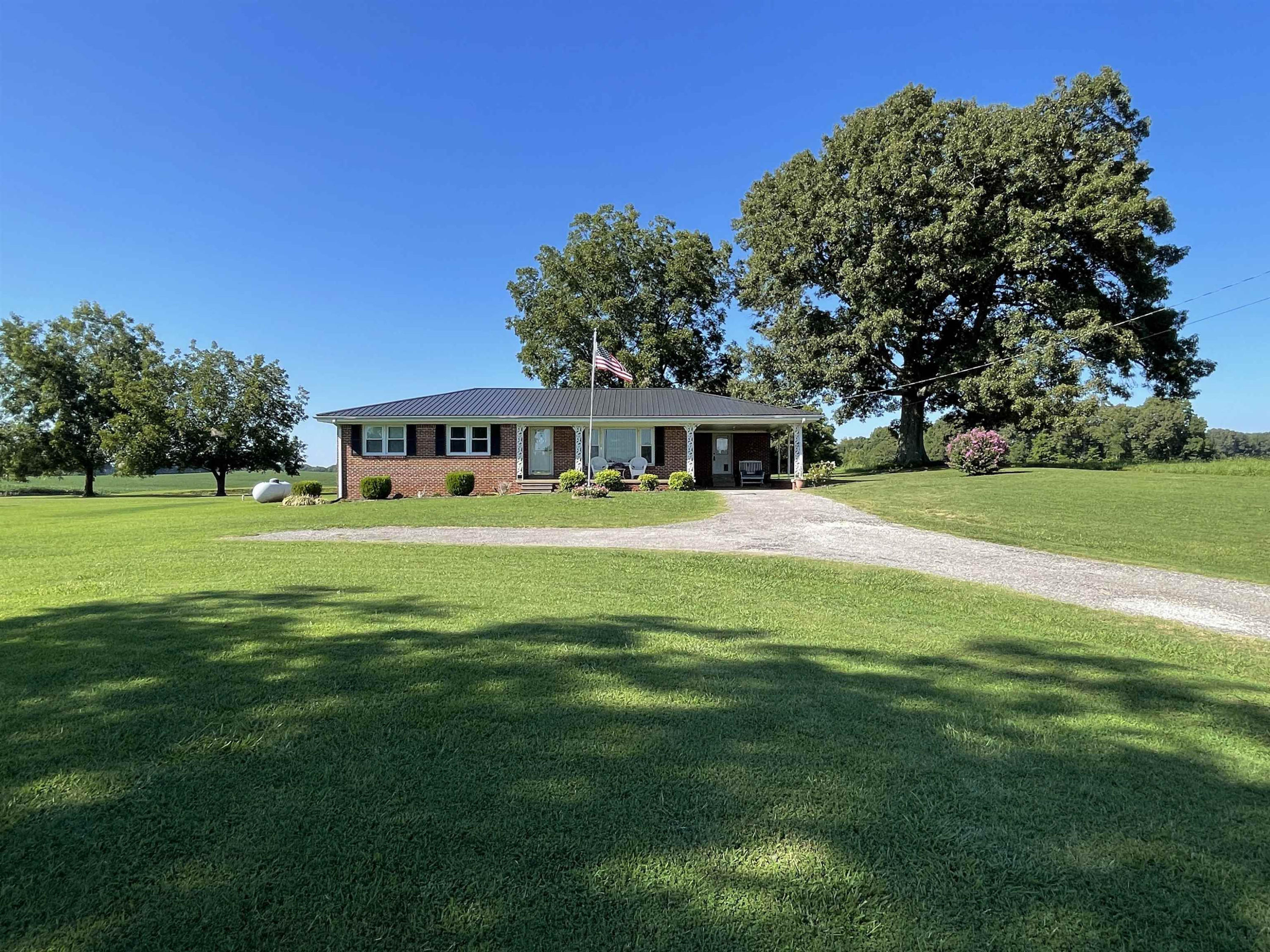 2507 East Grove Road Gleason, TN 38229 - Photo 36 of 37 a view of a house with a big yard