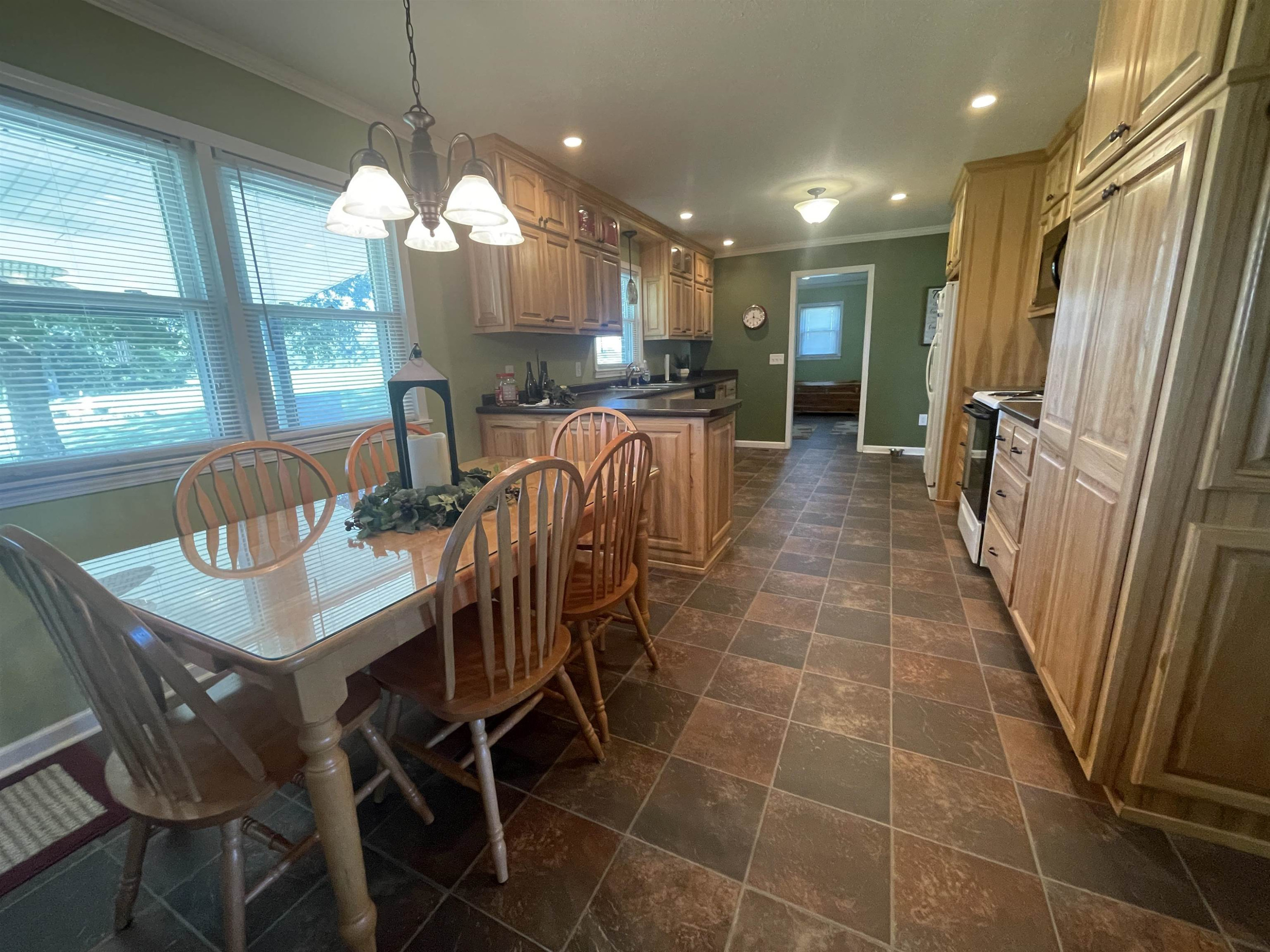 2507 East Grove Road Gleason, TN 38229 - Photo 9 of 37 a view of a dining room with furniture window and outside view