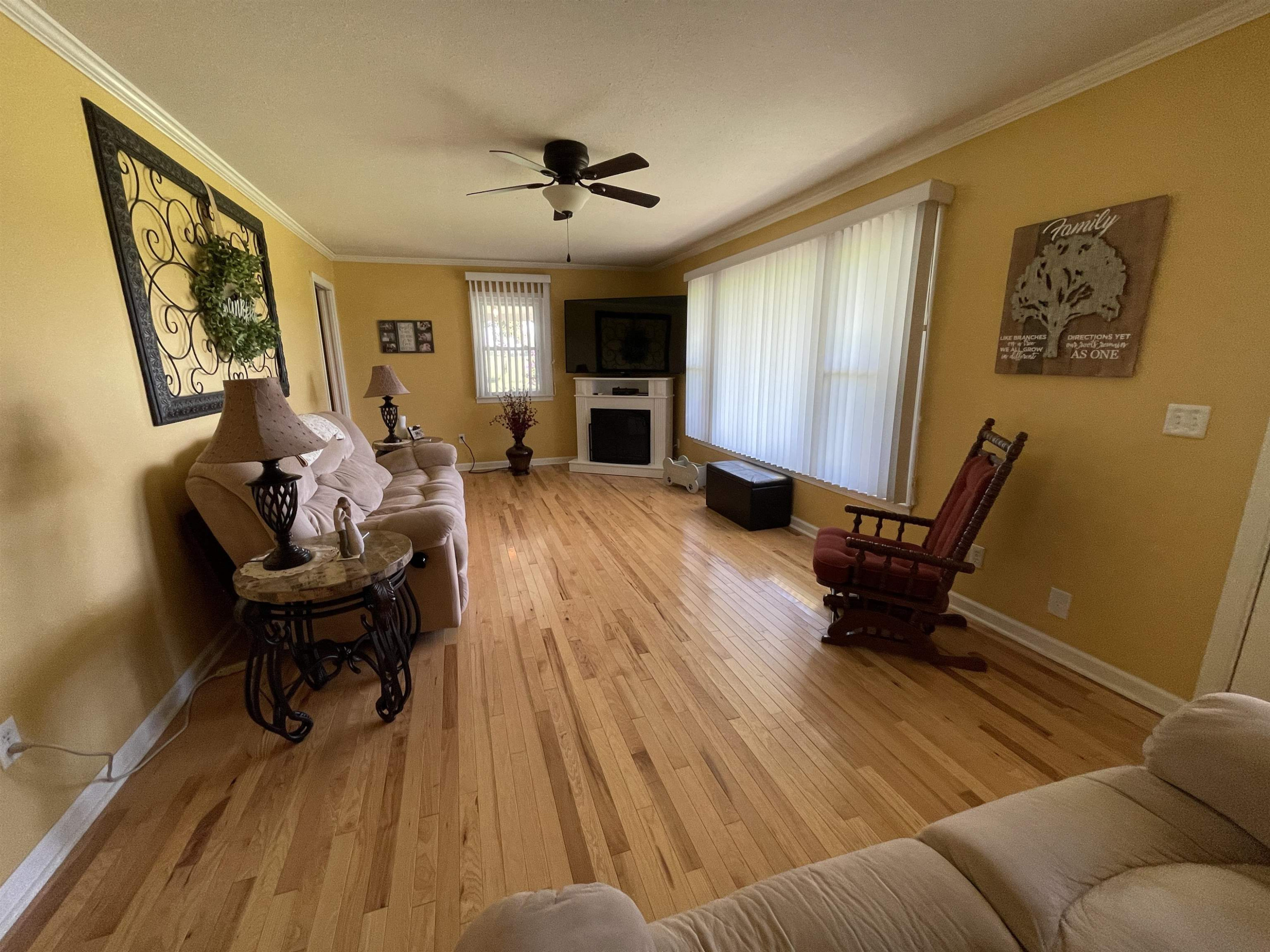 2507 East Grove Road Gleason, TN 38229 - Photo 10 of 37 a living room with furniture and a wooden floor