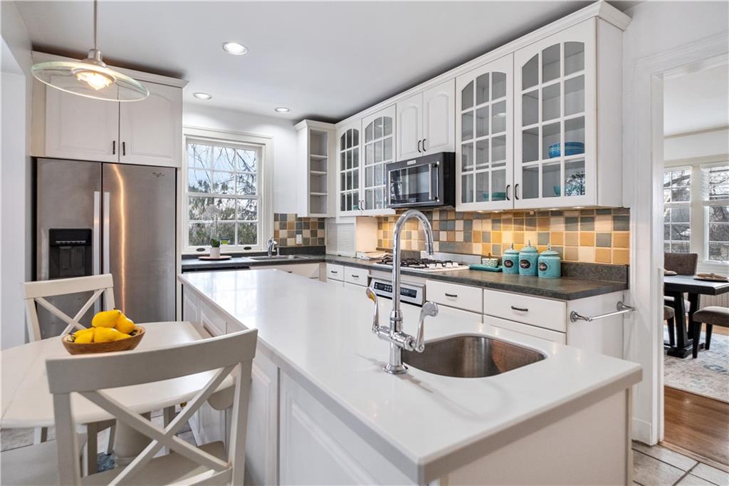 4305 Centre Pittsburgh, PA 15213 - Photo 17 of 47 a kitchen with a sink refrigerator and cabinets