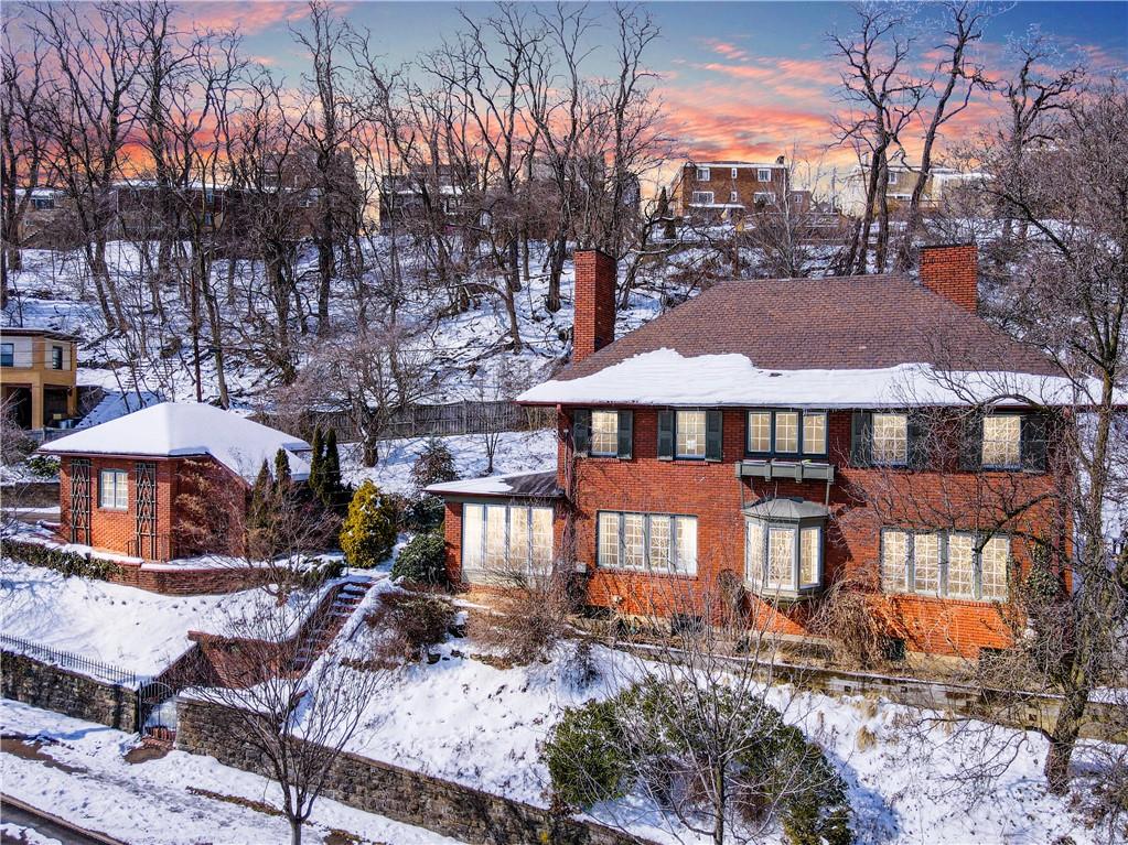 4305 Centre Pittsburgh, PA 15213 - Photo 2 of 47 a view of a patio with table and chairs under an umbrella