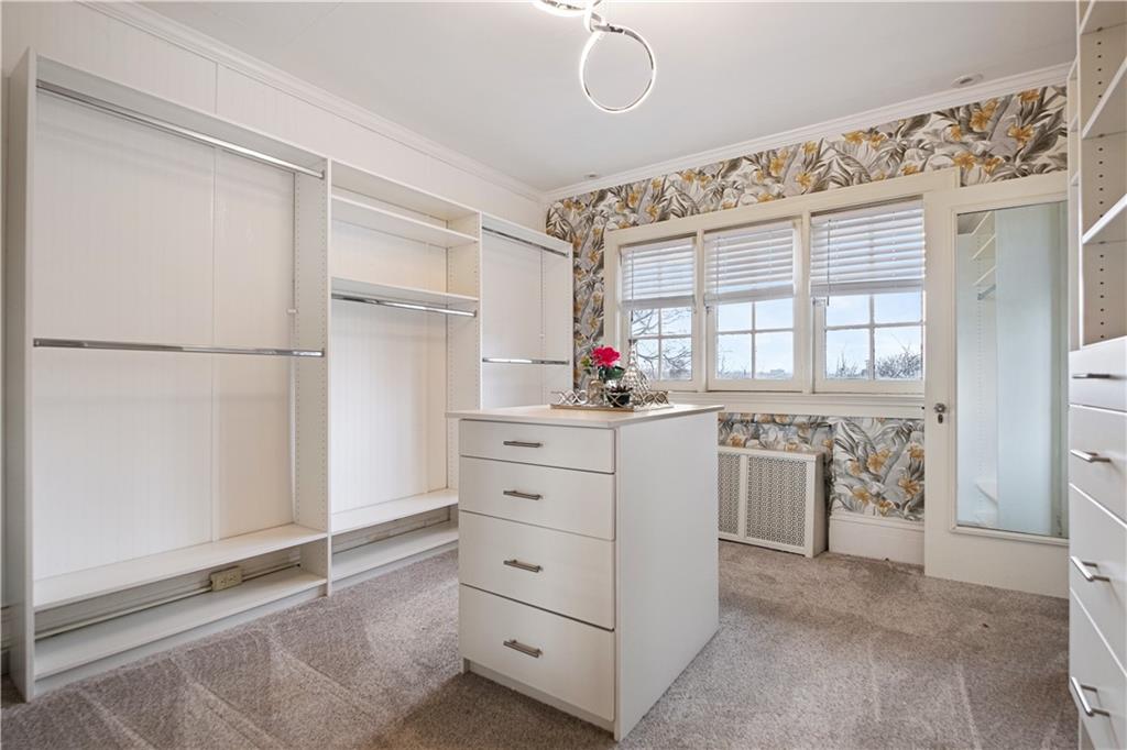 4305 Centre Pittsburgh, PA 15213 - Photo 27 of 47 a kitchen with white cabinets and window