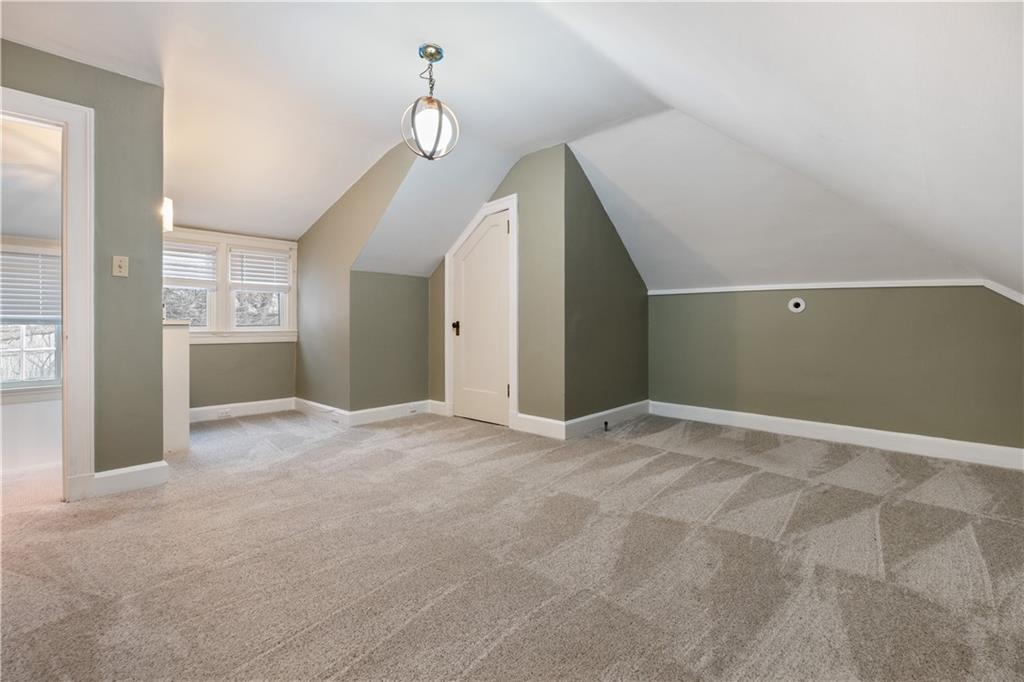 4305 Centre Pittsburgh, PA 15213 - Photo 33 of 47 a view of an empty room with wooden floor and staircase