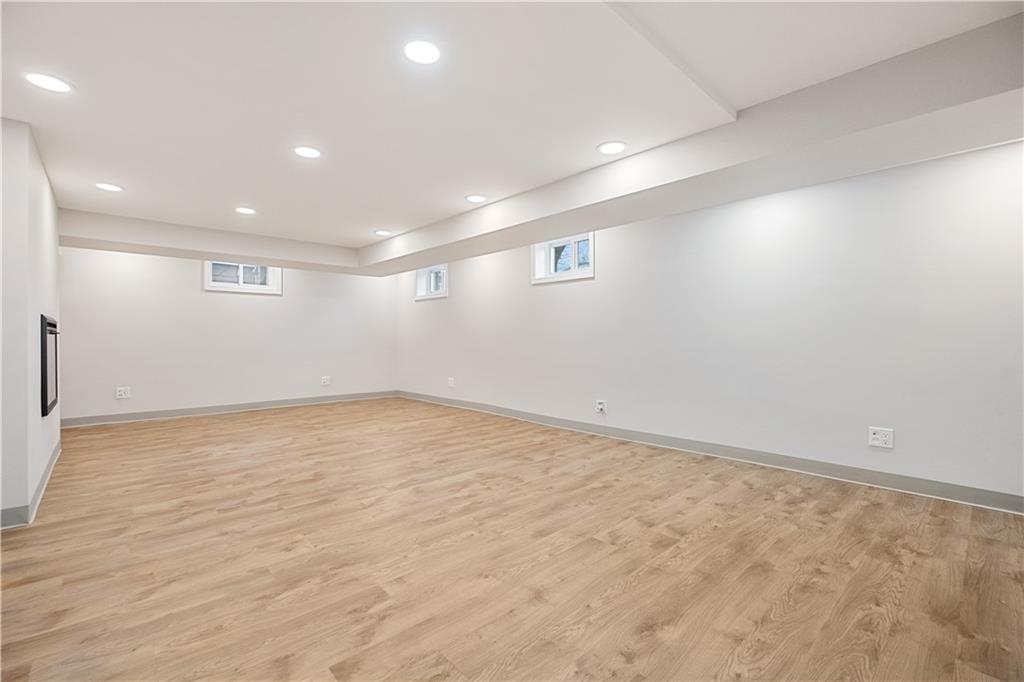 4305 Centre Pittsburgh, PA 15213 - Photo 38 of 47 an empty room with wooden floor and windows