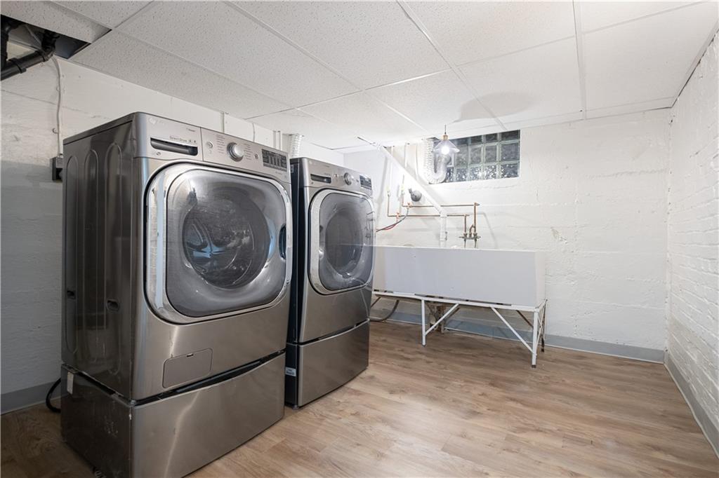 4305 Centre Pittsburgh, PA 15213 - Photo 41 of 47 a utility room with sink dryer and washer