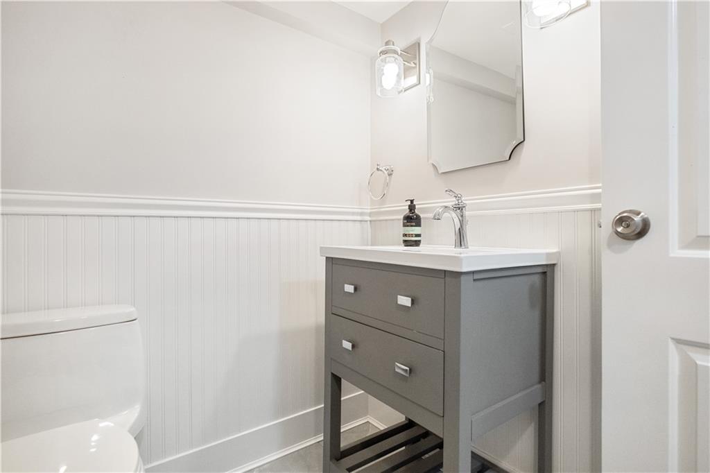 4305 Centre Pittsburgh, PA 15213 - Photo 42 of 47 a bathroom with a sink and a mirror
