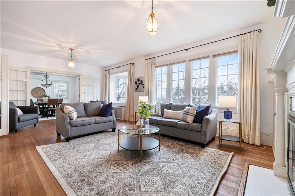 4305 Centre Pittsburgh, PA 15213 - Photo 9 of 47 a living room with furniture and a large window