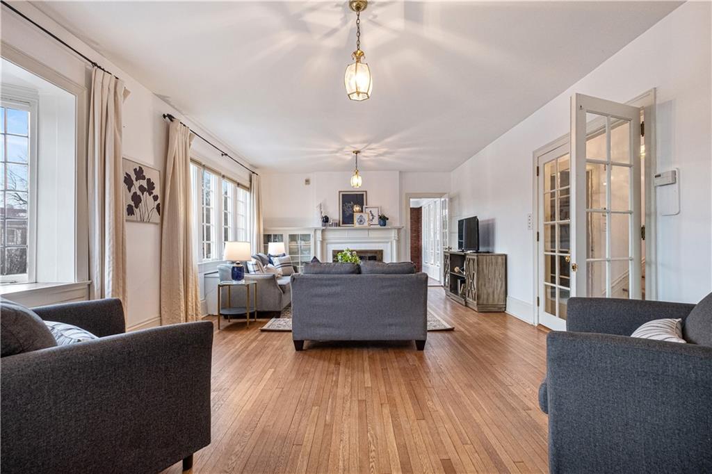 4305 Centre Pittsburgh, PA 15213 - Photo 10 of 47 a living room with furniture and a wooden floor