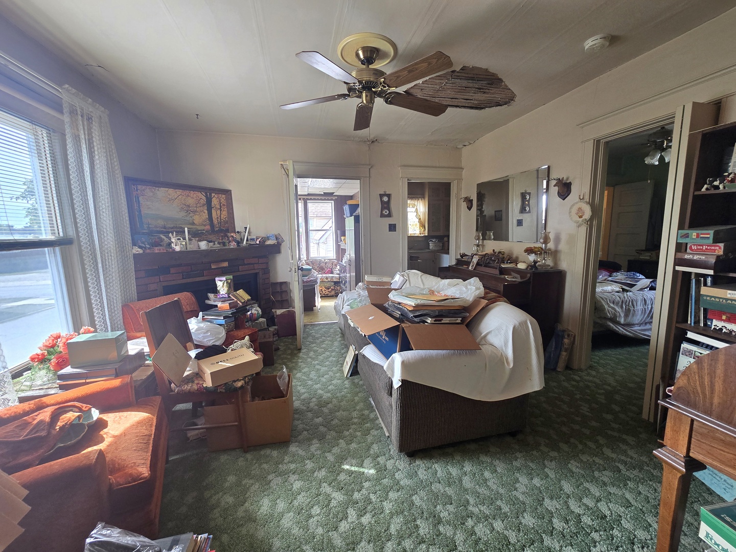 157-159 West Hickory Street Kankakee, IL 60901 - Photo 13 of 33 a living room with furniture and a flat screen tv