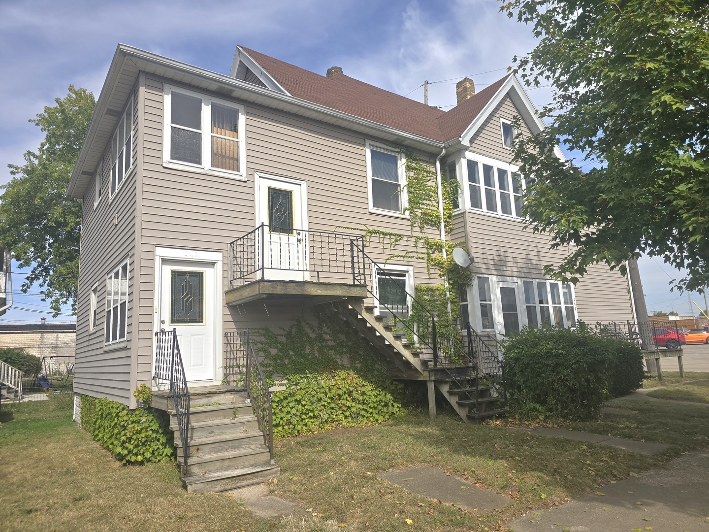 157-159 West Hickory Street Kankakee, IL 60901 - Photo 33 of 33 a view of a house with a yard