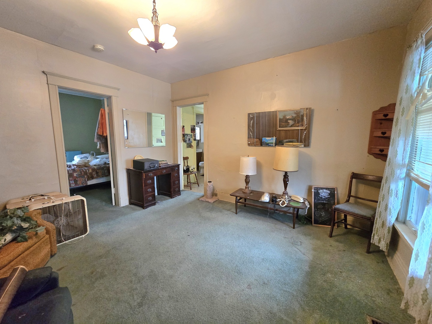 157-159 West Hickory Street Kankakee, IL 60901 - Photo 39 of 40 a living room with furniture and a flat screen tv