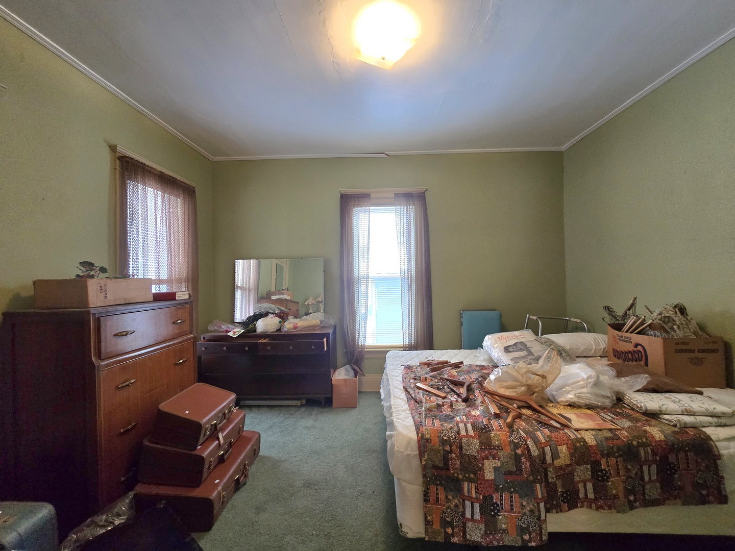 157-159 West Hickory Street Kankakee, IL 60901 - Photo 40 of 40 a bedroom with a bed and a windows