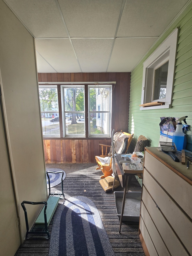 157-159 West Hickory Street Kankakee, IL 60901 - Photo 6 of 33 a work room with furniture and windows
