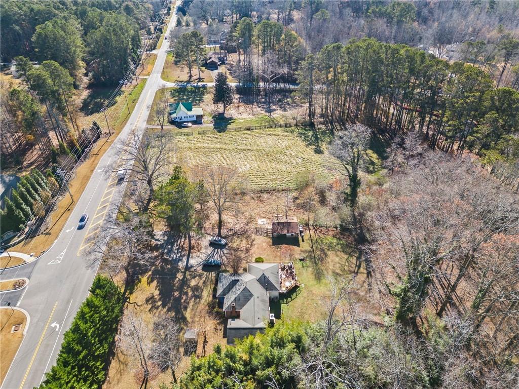16440 Hopewell Road Alpharetta, GA 30004 - Photo 3 of 6 a view of a yard with plants