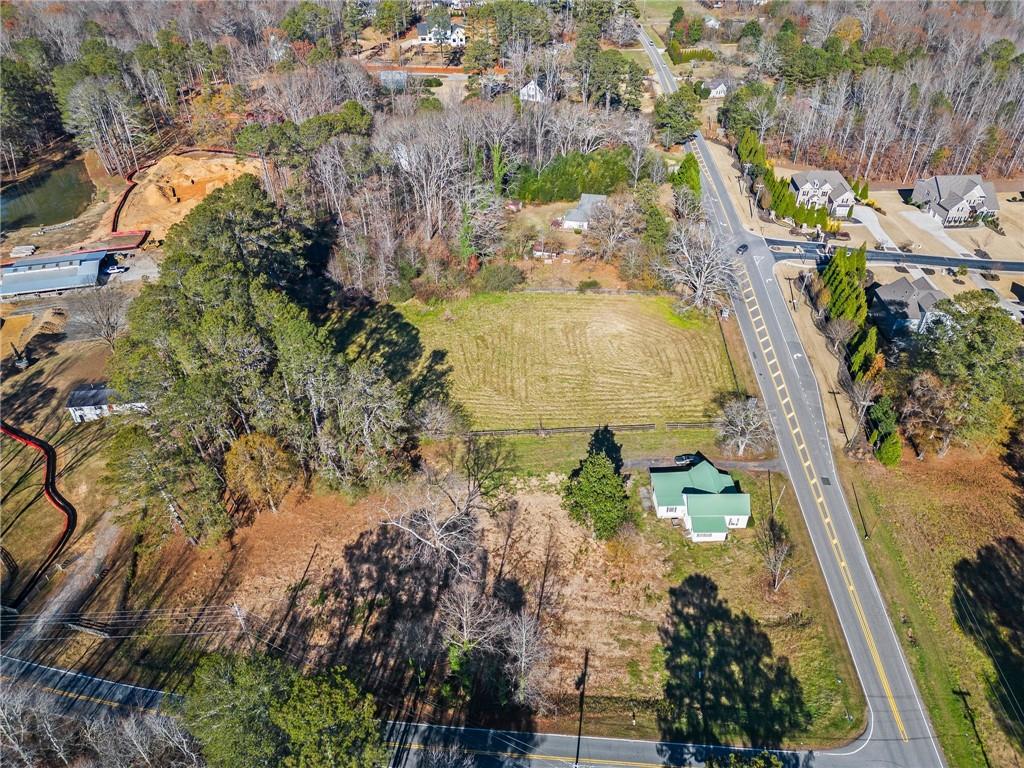 16440 Hopewell Road Alpharetta, GA 30004 - Photo 6 of 6 an aerial view of residential houses with outdoor space