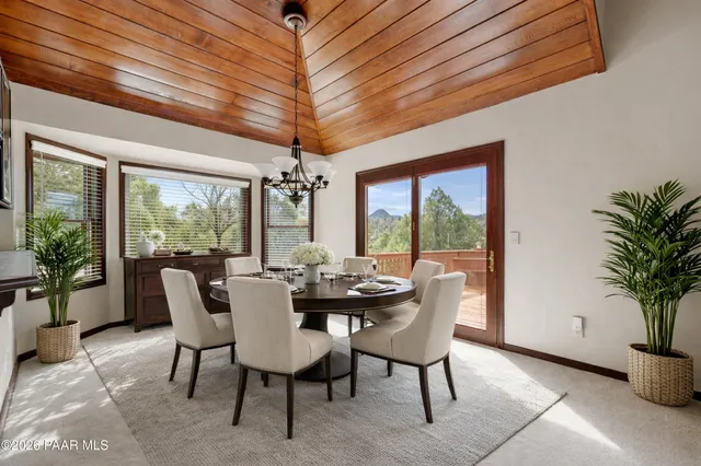 a bathroom with double vanity sinks a vanity a mirror and a shower