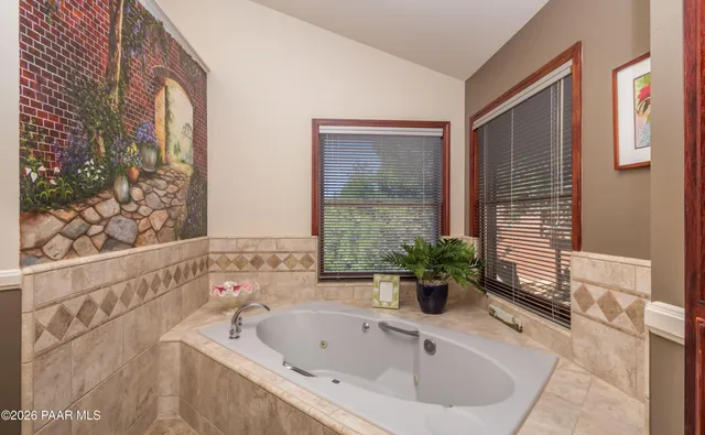 a kitchen that has a sink and a stove in it