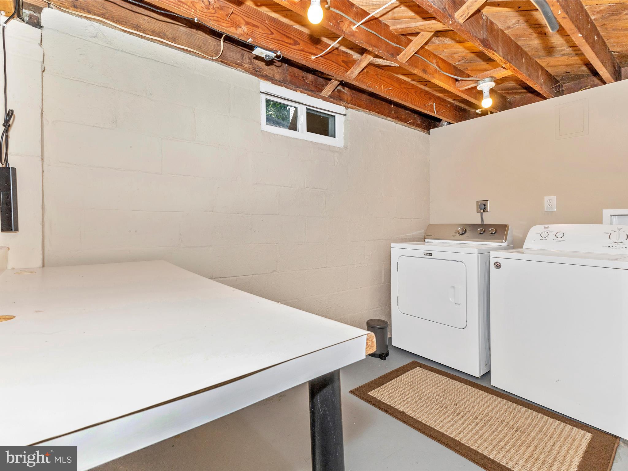 12230 Selfridge Road Silver Spring, MD 20906 - Photo 36 of 49 a utility room with dryer and washer