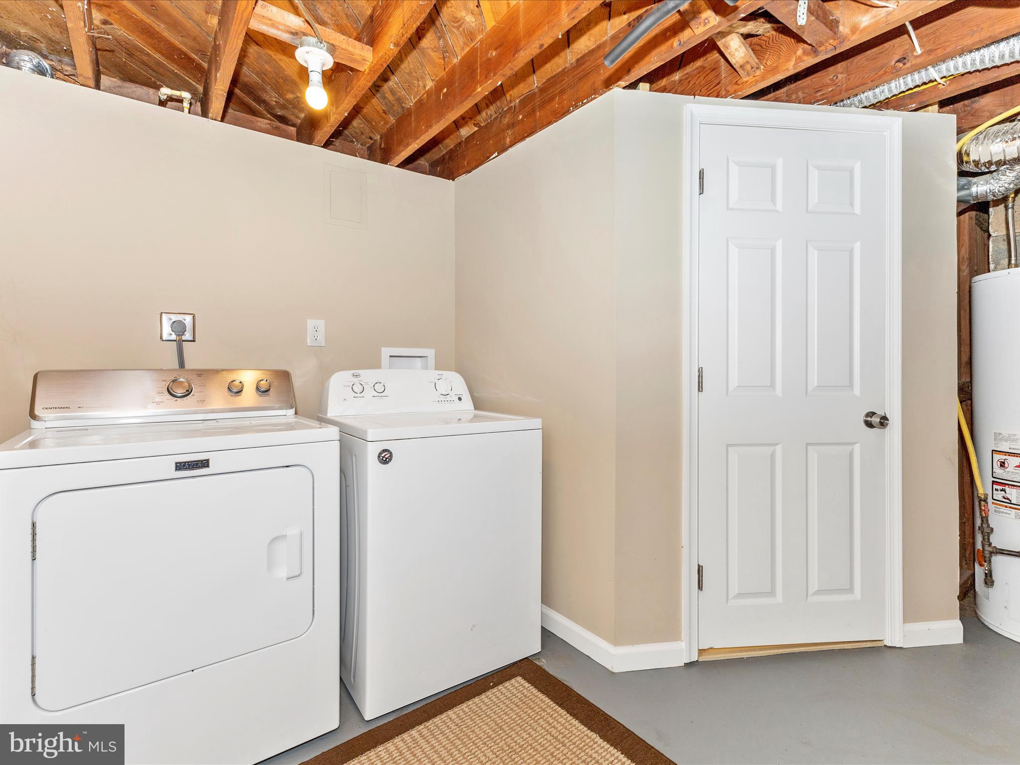 12230 Selfridge Road Silver Spring, MD 20906 - Photo 37 of 49 a utility room with dryer and washer