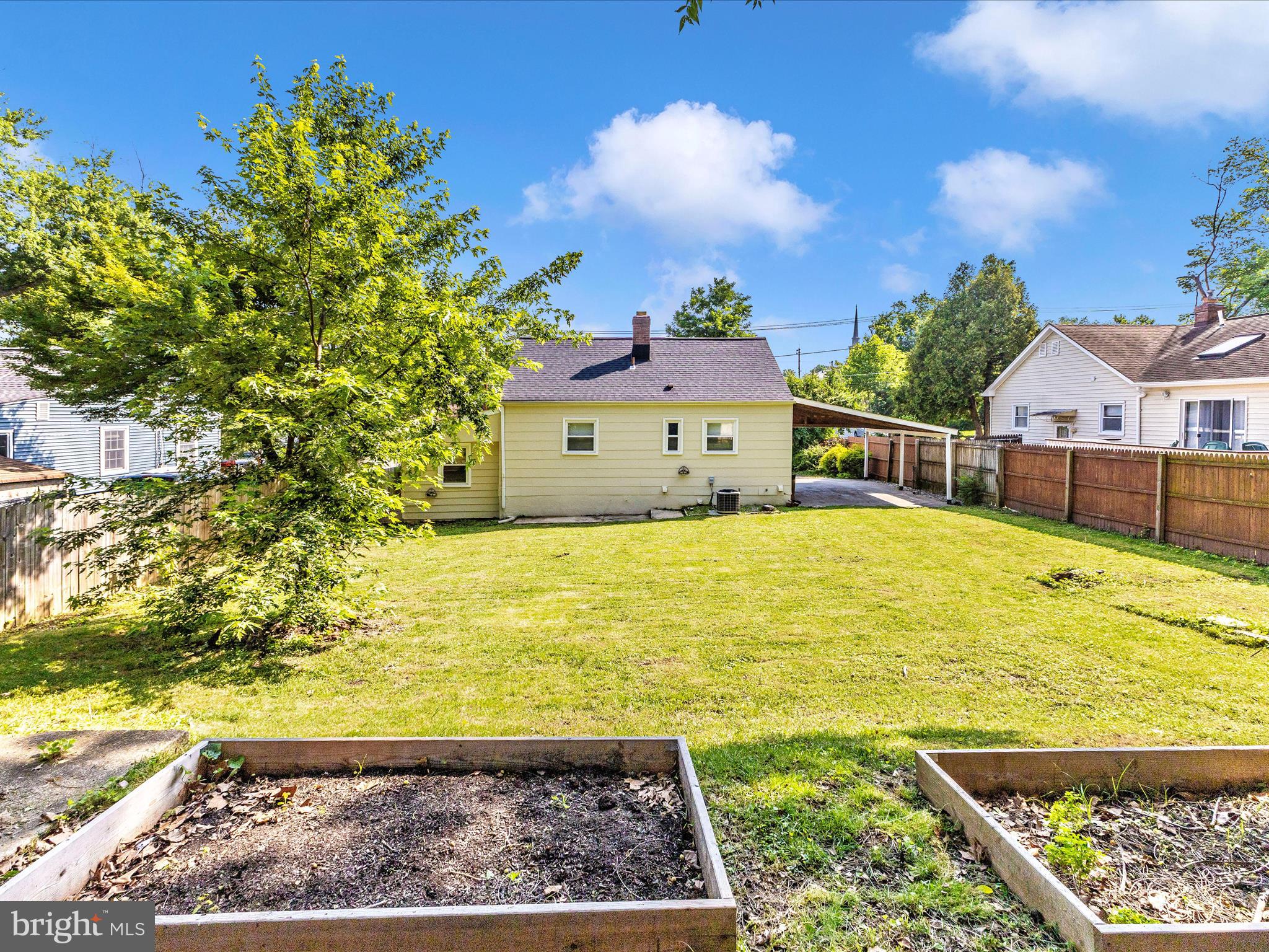 12230 Selfridge Road Silver Spring, MD 20906 - Photo 39 of 49 a view of a swimming pool with a yard