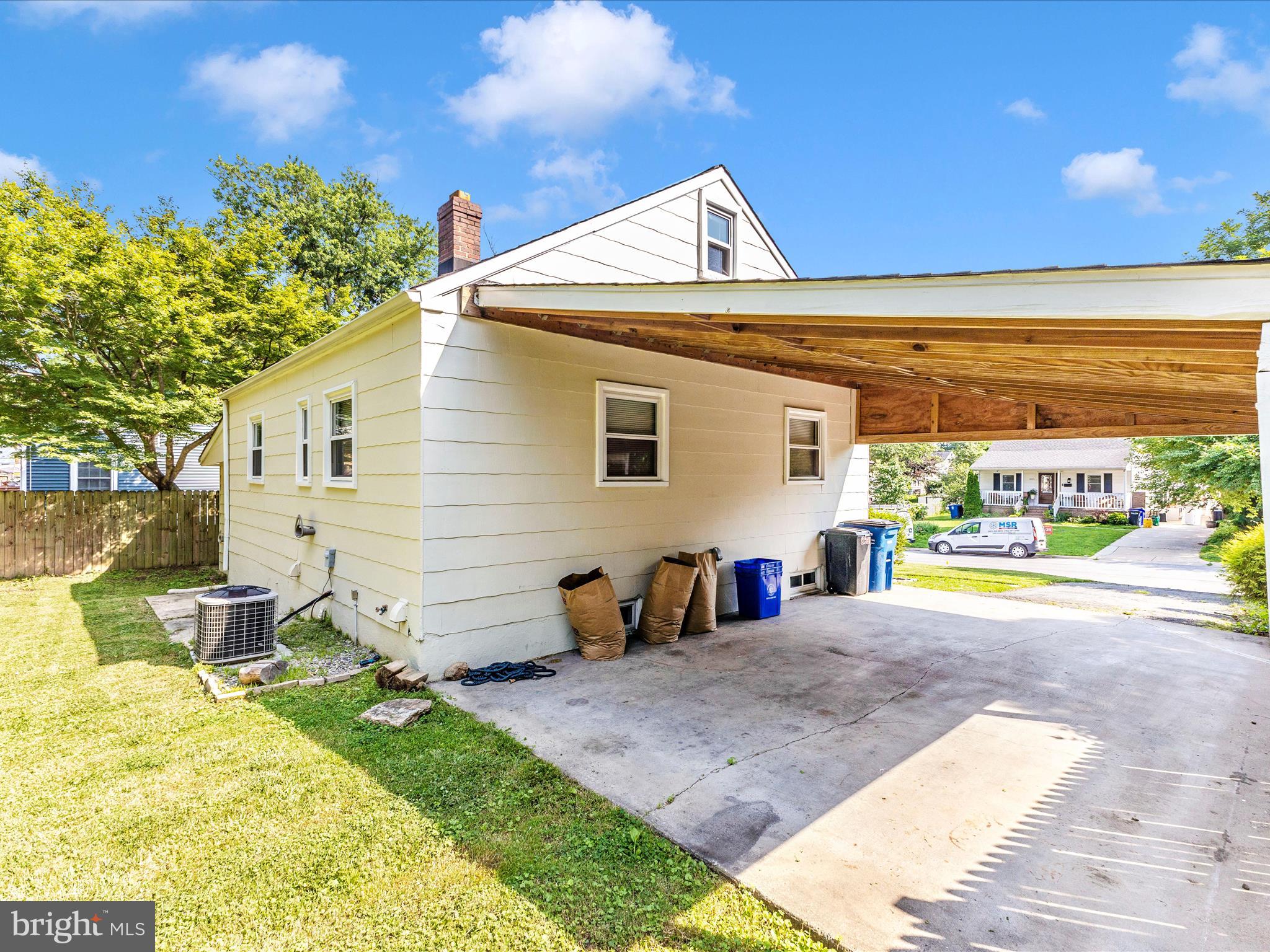 12230 Selfridge Road Silver Spring, MD 20906 - Photo 41 of 49 a view of a house with backyard and sitting area