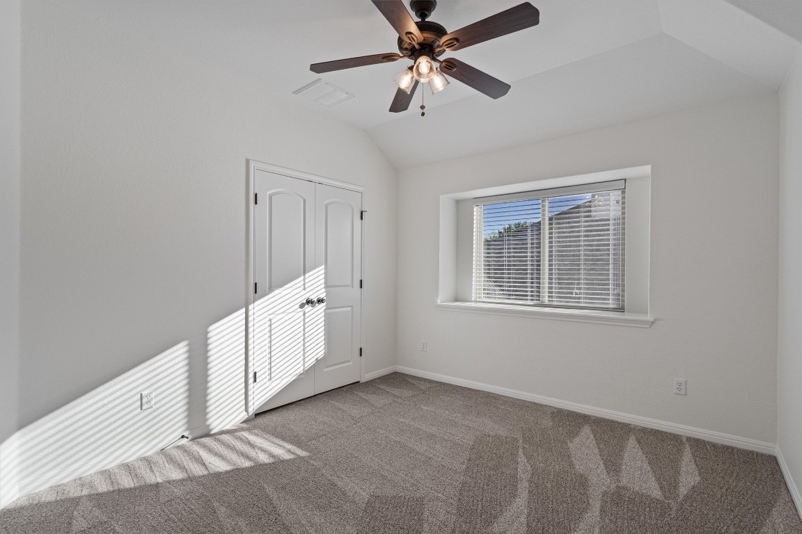 422 Village Commons Boulevard Georgetown, TX 78633 - Photo 29 of 40 a view of an empty room with a window