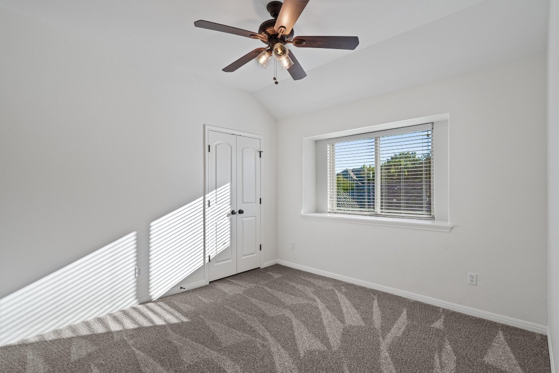 422 Village Commons Boulevard Georgetown, TX 78633 - Photo 32 of 40 a view of an empty room with a window