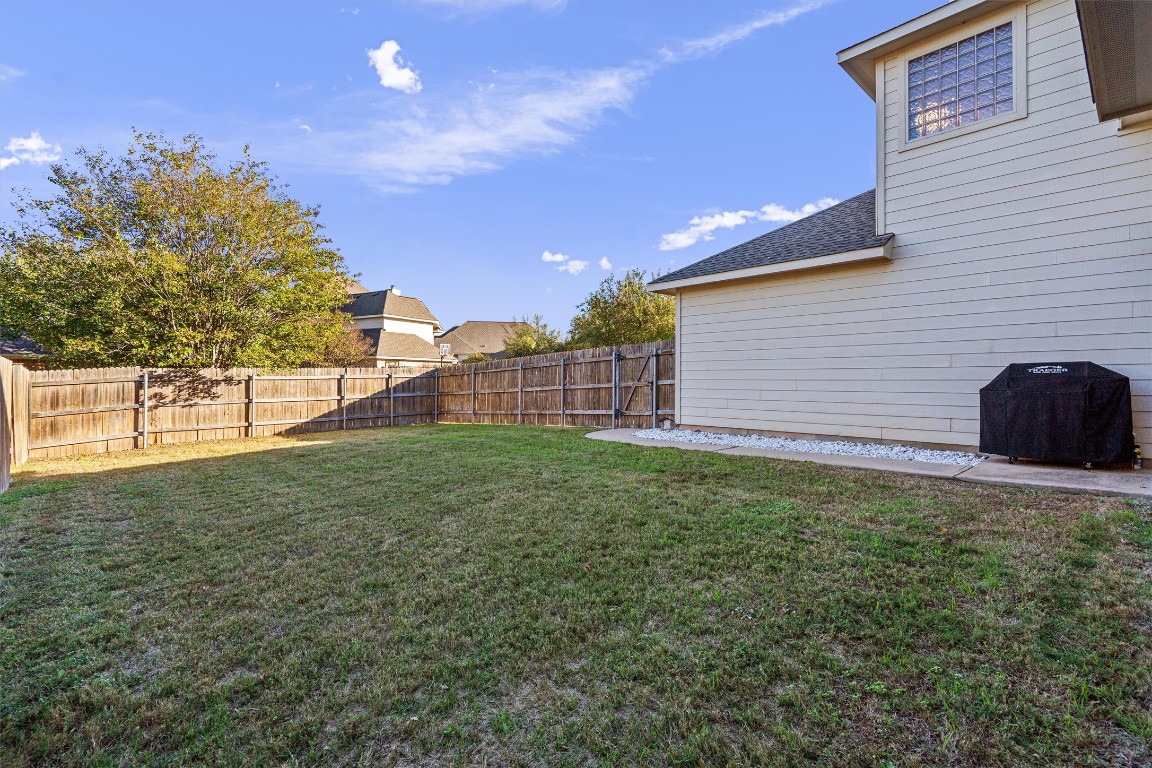 422 Village Commons Boulevard Georgetown, TX 78633 - Photo 34 of 40 a view of a backyard