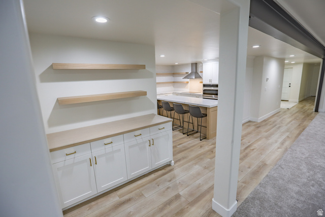 126 North 800 West Mapleton, UT 84664 - Photo 51 of 79 Bar featuring light wood-style flooring, white cabinets, open shelves, recessed lighting, and light stone countertops