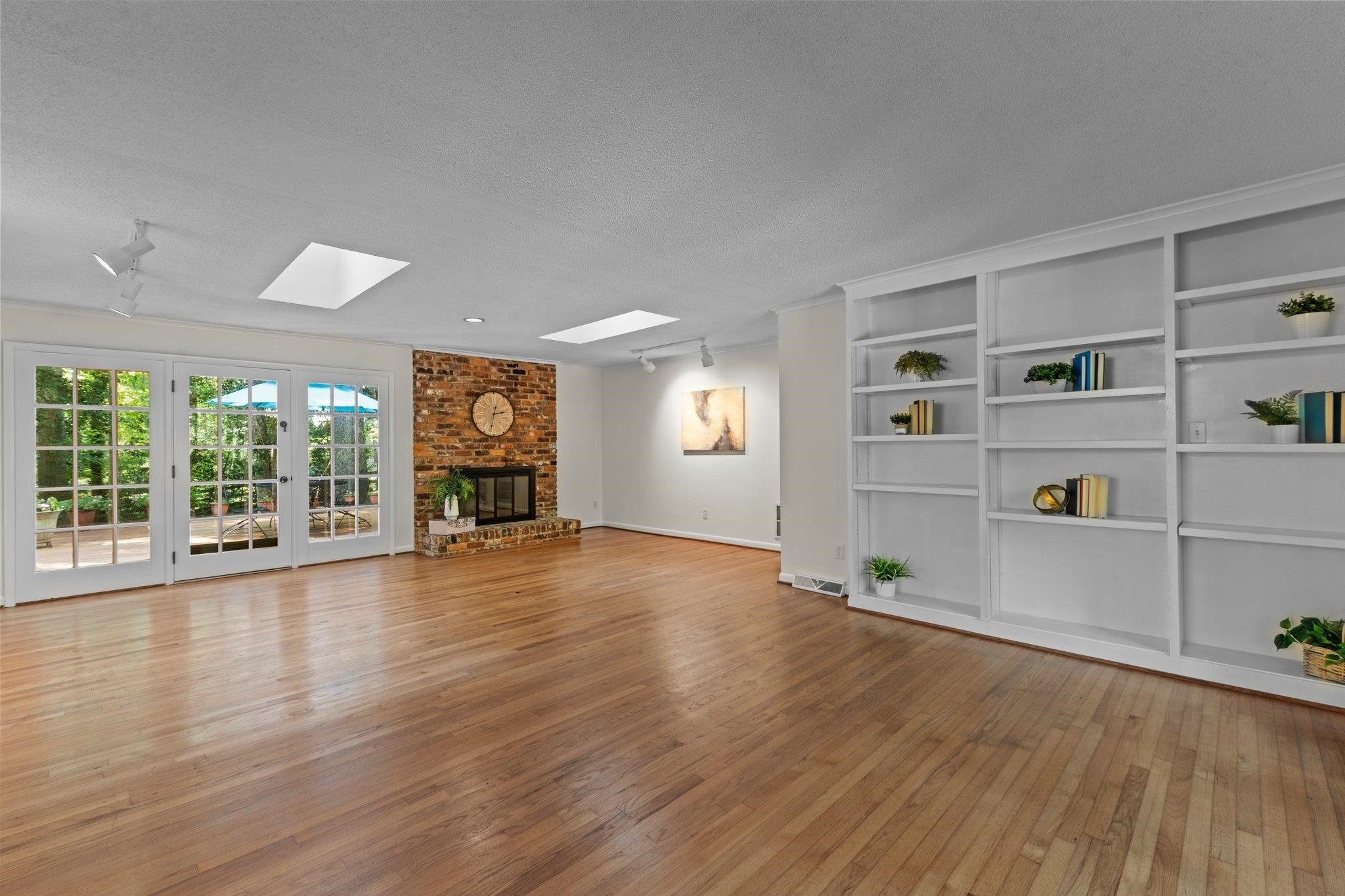 4505 Eliot Place Raleigh, NC 27609 - Photo 5 of 51 Another view of the Family Room. Built in shelving for photos, vases, etc. Family Room