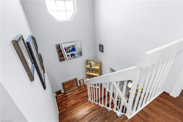 a view of entryway with stairs and wooden floor