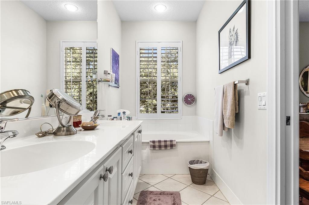 5733 Cove Circle Naples, FL 34119 - Photo 17 of 33 MASTER BATHROOM