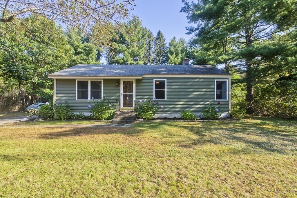 418 Ryan Road Northampton, MA 01062 - Photo 1 of 36 a view of a house with a yard and large trees