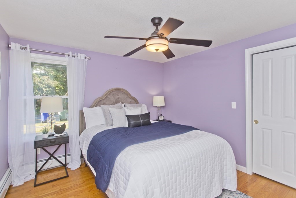418 Ryan Road Northampton, MA 01062 - Photo 11 of 36 a bedroom with a bed a dresser and chair