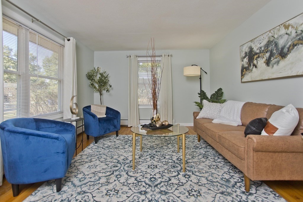 418 Ryan Road Northampton, MA 01062 - Photo 18 of 36 a living room with furniture and a potted plant