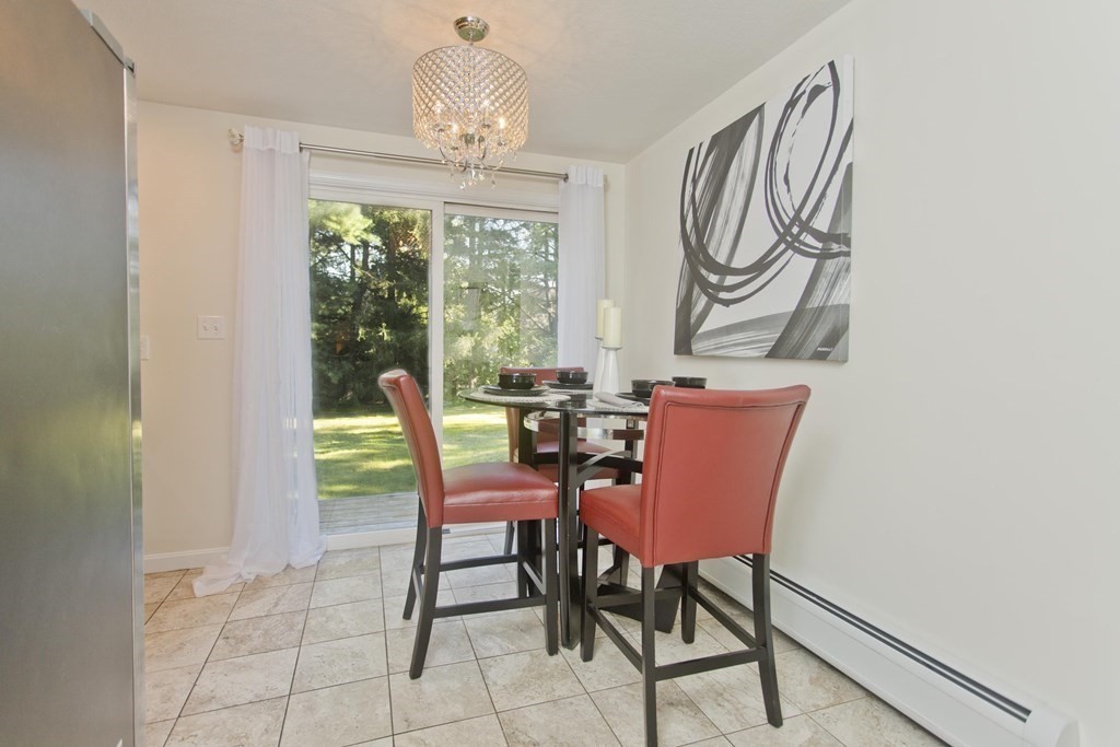 418 Ryan Road Northampton, MA 01062 - Photo 23 of 36 a view of a dining room with furniture window and outside view