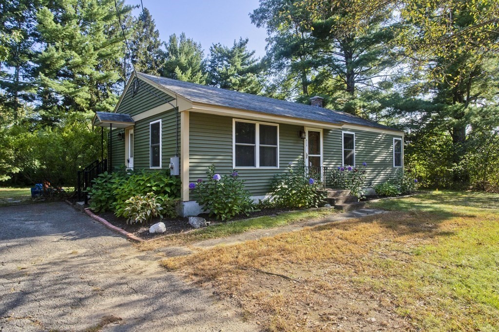 418 Ryan Road Northampton, MA 01062 - Photo 3 of 36 a front view of house with yard and green space