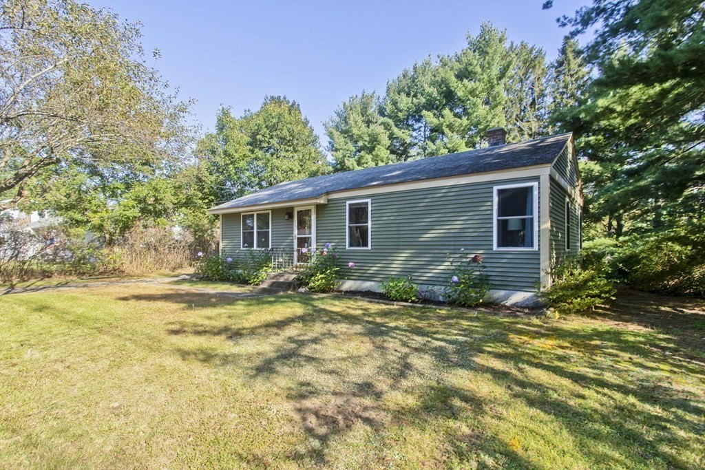 418 Ryan Road Northampton, MA 01062 - Photo 4 of 36 a view of a house with backyard and trees