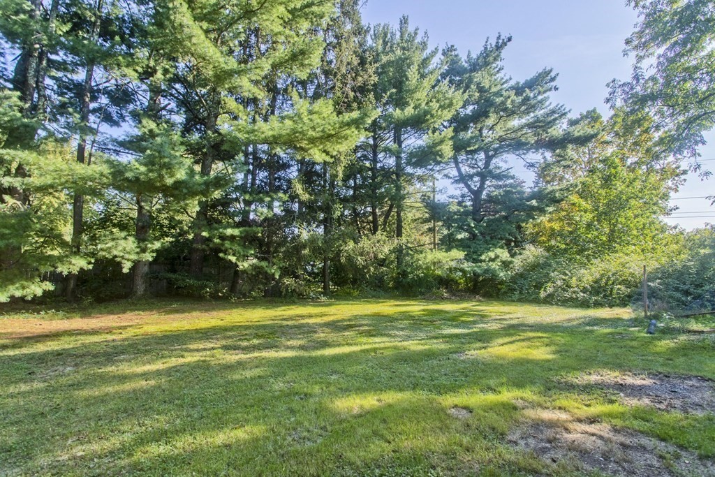 418 Ryan Road Northampton, MA 01062 - Photo 5 of 36 a view of a golf course with a trees