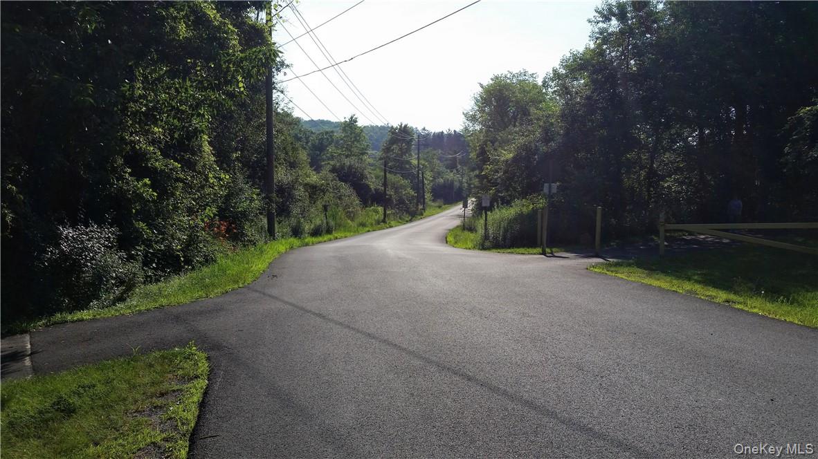 Tbd Old Chester & Duck Farm Road Goshen, NY 10924 - Photo 14 of 35 a view of a street with a bench