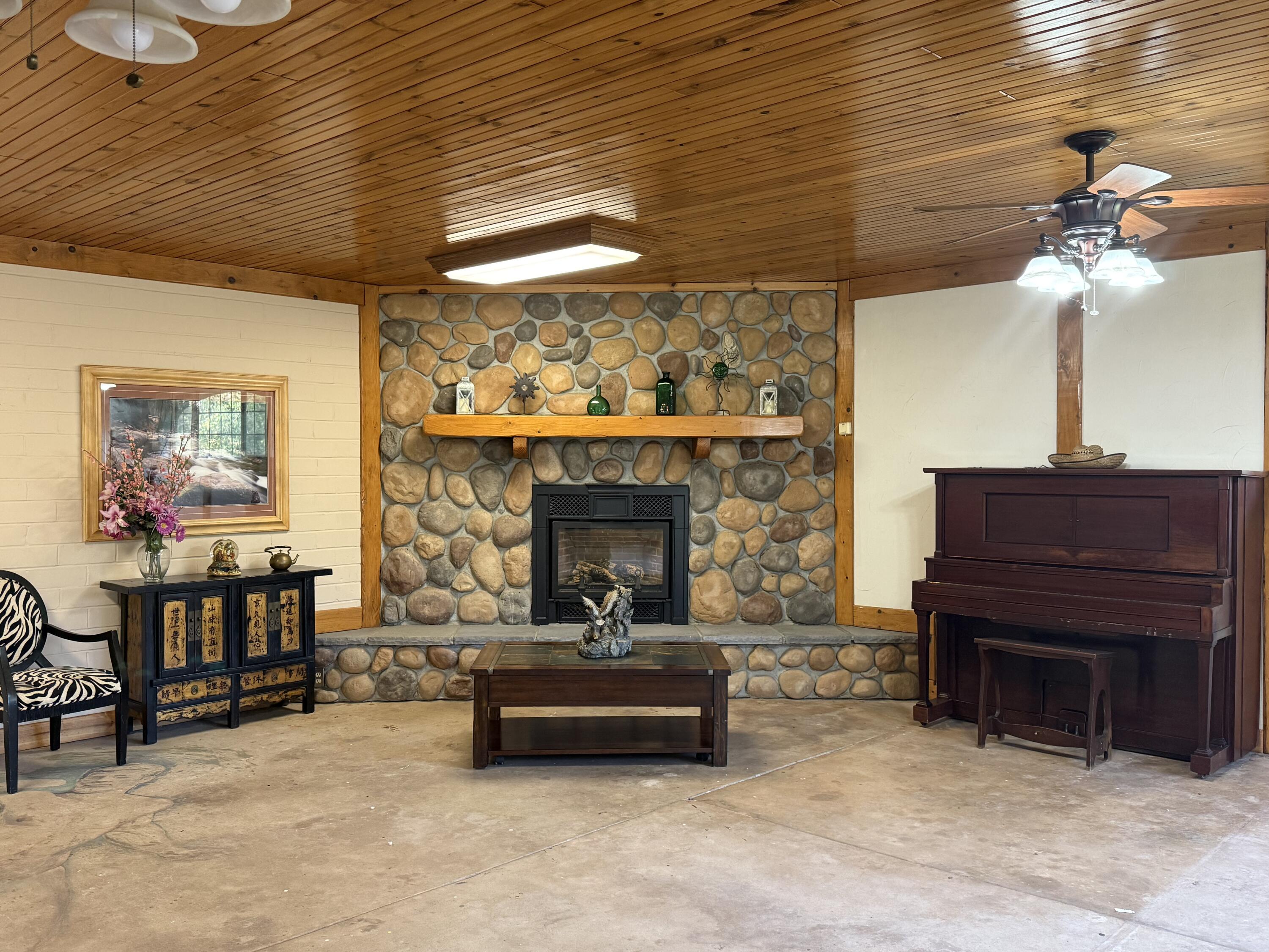 42751 North Fork Drive Three Rivers, CA 93271 - Photo 9 of 13 a living room with furniture and a fireplace