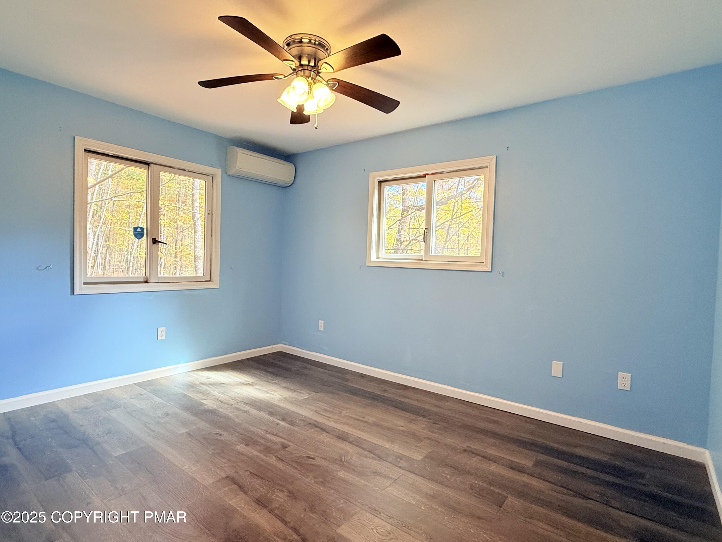 303 Otter Court Bushkill, PA 18324 - Photo 11 of 18 a view of an empty room with a window