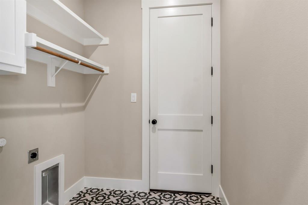207 West 7th Street Justin, TX 76247 - Photo 18 of 40 a bathroom with a glass door shower