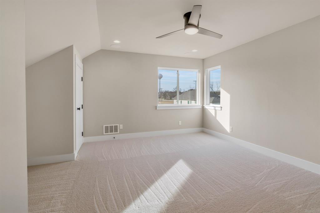 207 West 7th Street Justin, TX 76247 - Photo 28 of 40 a view of an empty room with a window